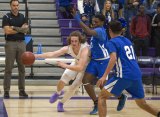 Lemoore's Will Schalde has his eyes set on the basket in Thursday's home contest against Hanford West High School. Lemoore lost the game 82-59.